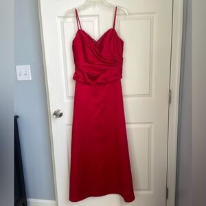 Beautiful full-length red formal dress with ruching and beading accent